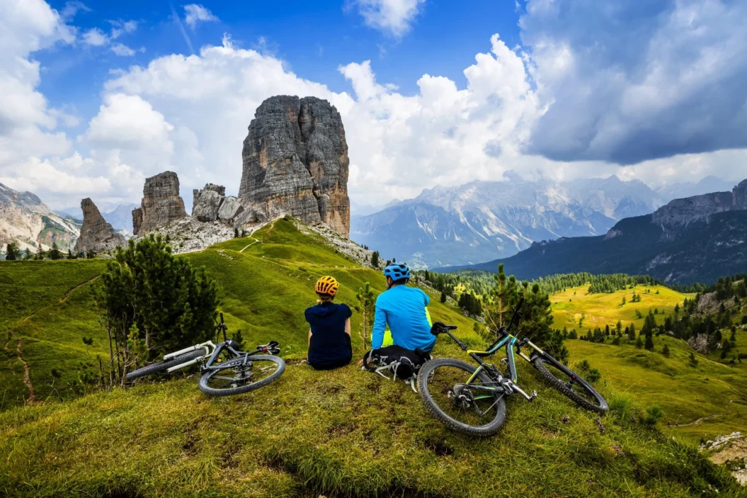 Cyclists looking at the mountain view in Cortina d'Ampezzo