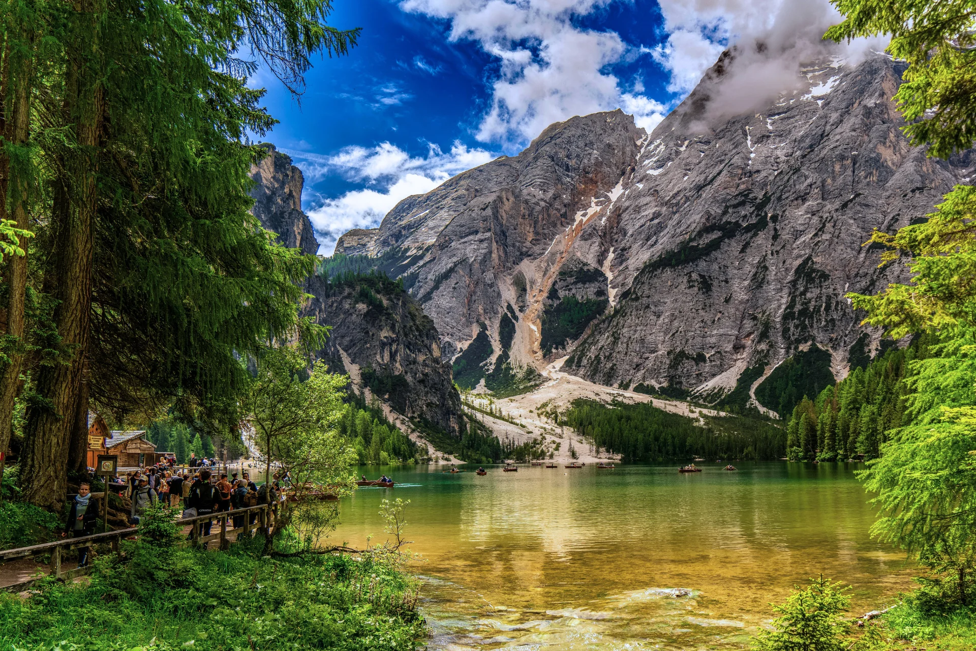 Tourists at Lago di Braies - North-eastern Dolomites.