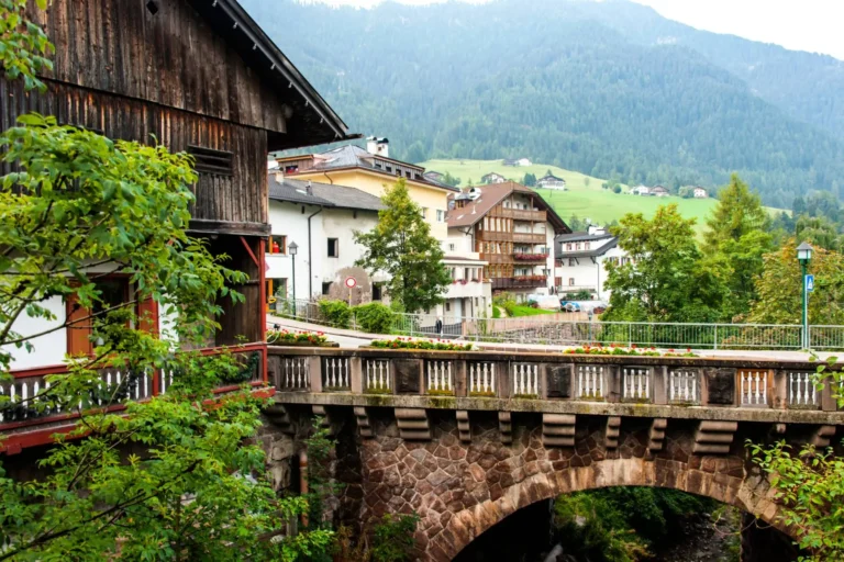 Ortisei village and historic bridge in Val Gardena.