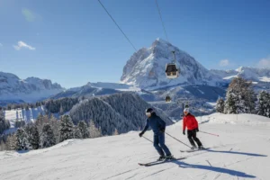 Skiers on the slopes at Val Gardena - Groeden Dolomites.