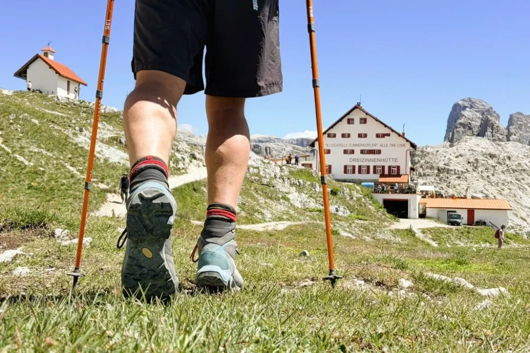 Hiker heading towards Rifugio Locatelli.