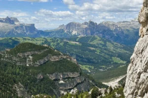 Sweeping views of Piz Boè, San Casiano, the Sella Group and Puez-Odle Group from the Forcella di Lago descent.