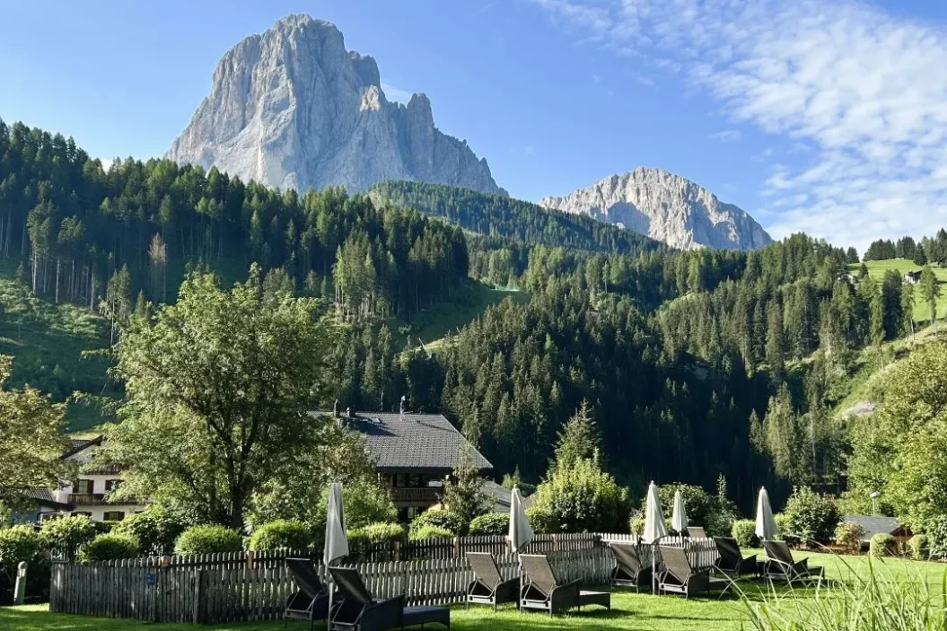 Santa Cristina with Sassolungo and Sasso Piato in the background.